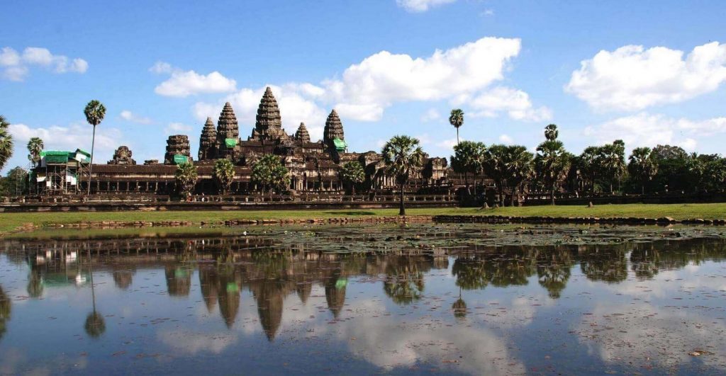 A beautiful view of the Angkor Wat across one of its lakes. ©www.the broadlife.com