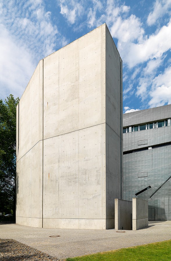 Holocaust Tower and Oleaster plants, growing out of the stelae. © Jens Ziehe