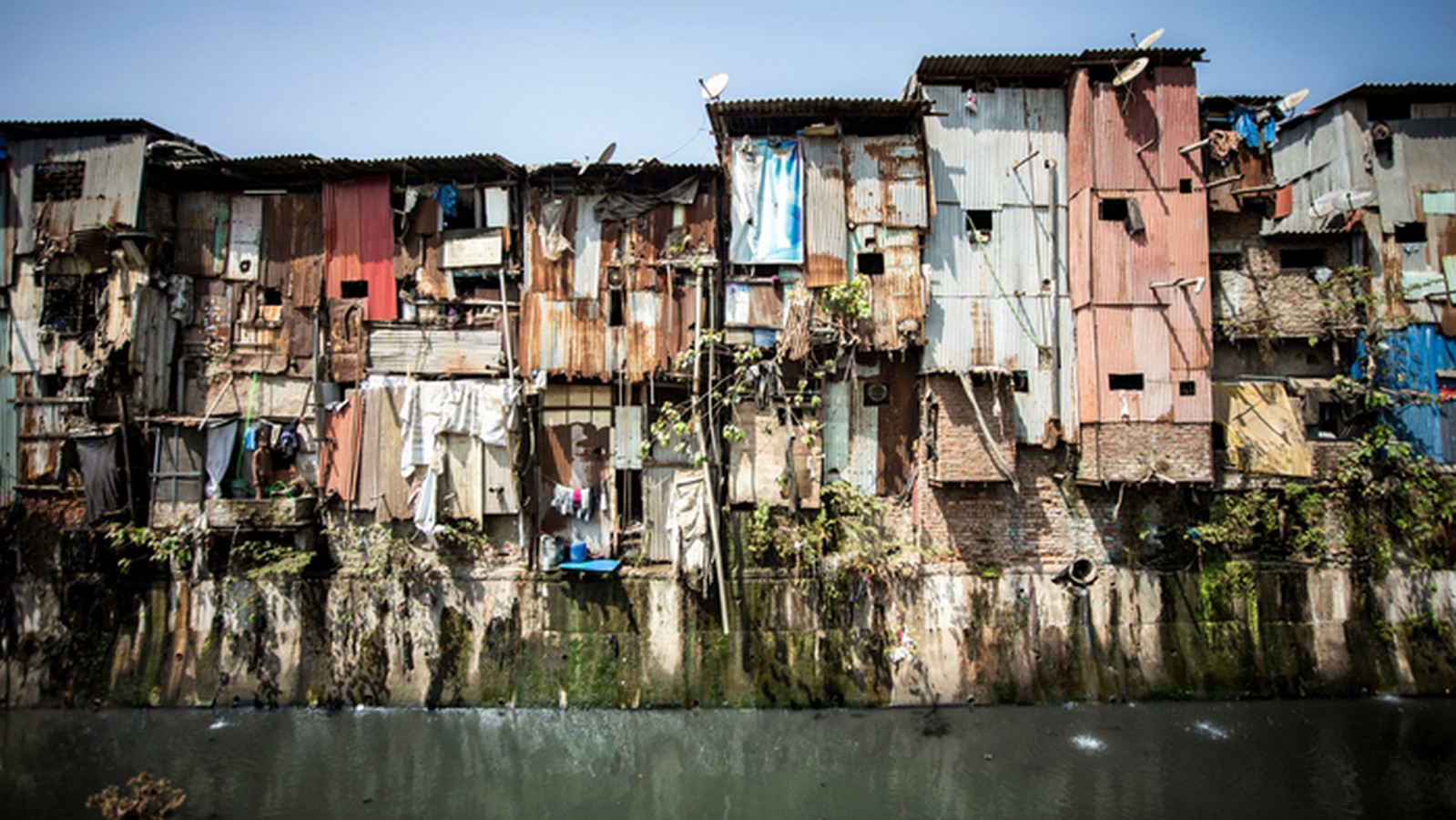 The socio-cultural imapct of slums in cities - Sheet6