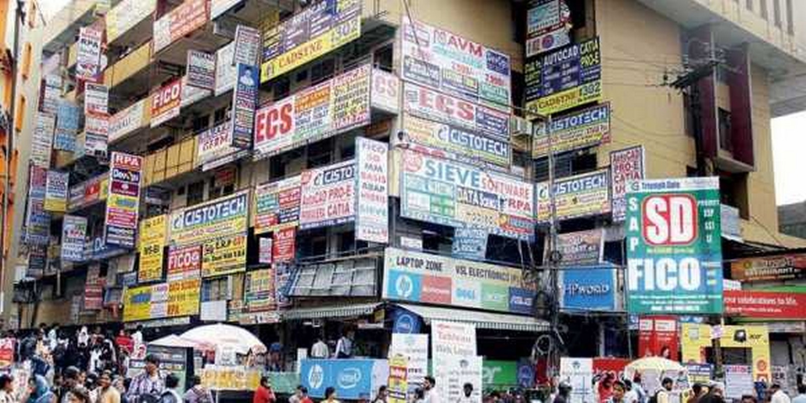 How do hoardings advertisements affect the architectural character of buildings - Sheet9