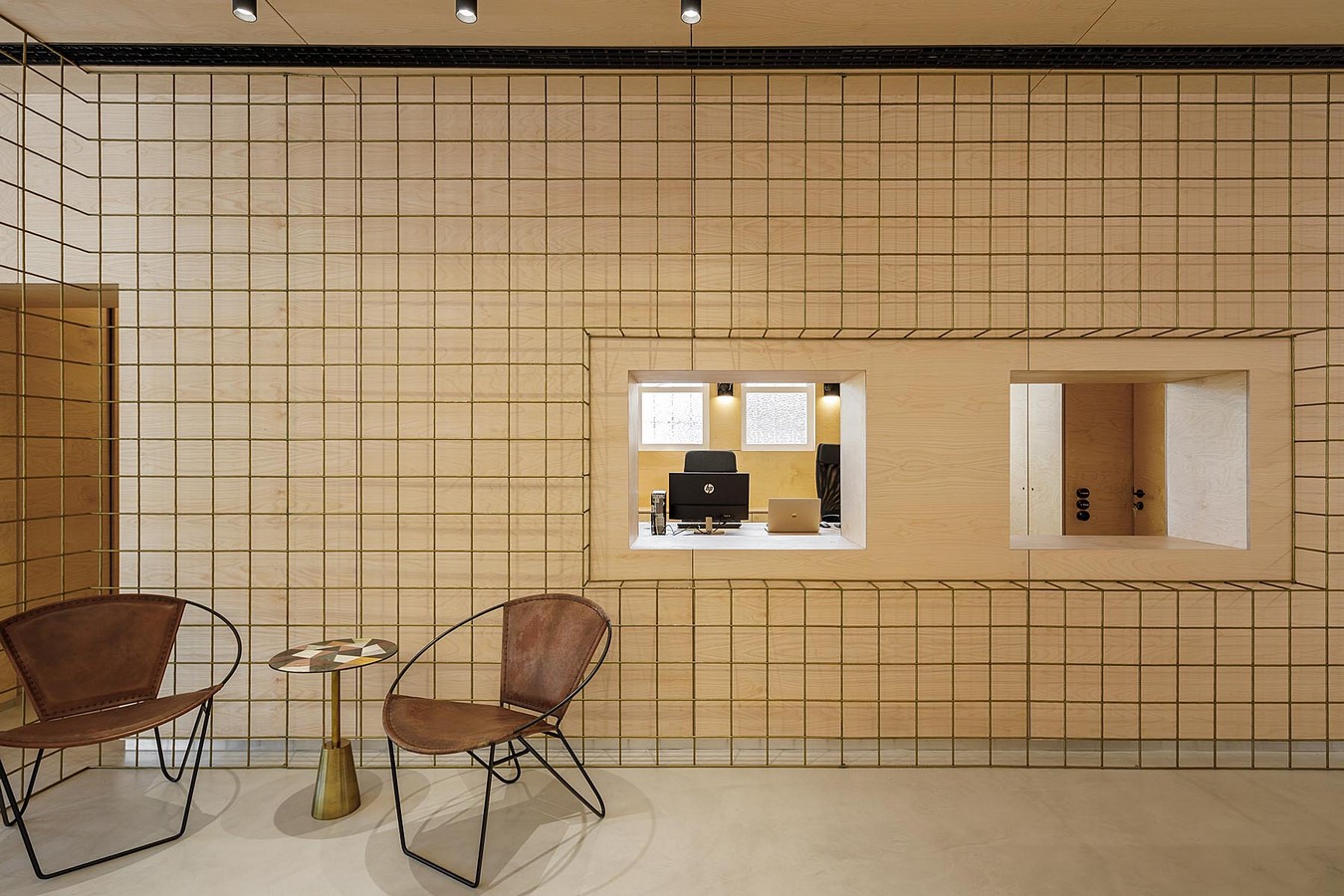 Interior Space divided with Golden Wire Meshes For Multiple Uses In This Store In Portugal by Stu.Dere- Sheet3