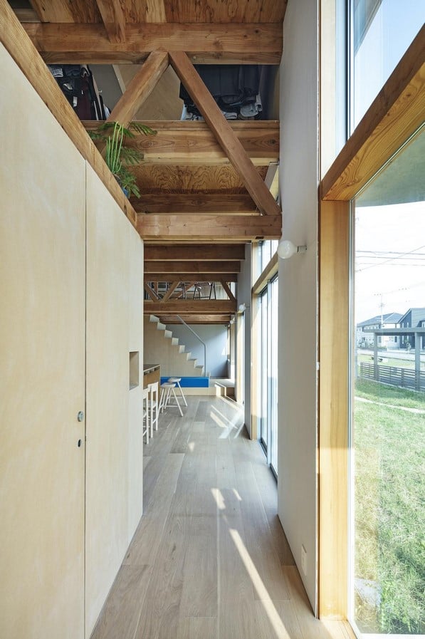 House in field' containing variety of living spaces beneath its gable roof designed by Ship Architecture - Sheet3