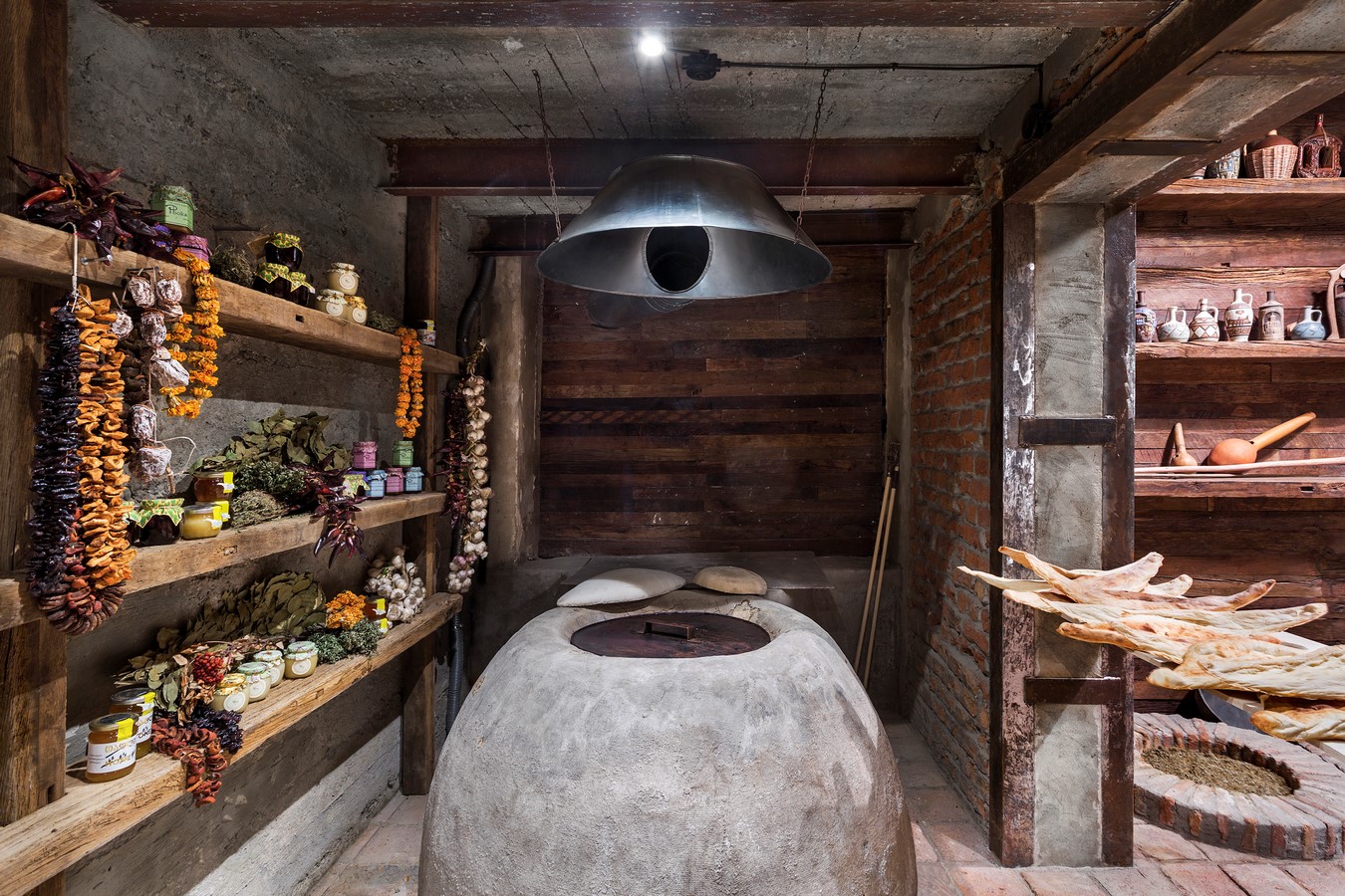 The space that captures you, the place where you lose the sense of time, the atmosphere that makes you calm, it’s Vineria, wine cellar in the central part of Old Tbilisi. From a chaotic, busy street we suddenly get into the space that is completely isolated from the city, street, people, noise, and creates its own world.: Sheet 1