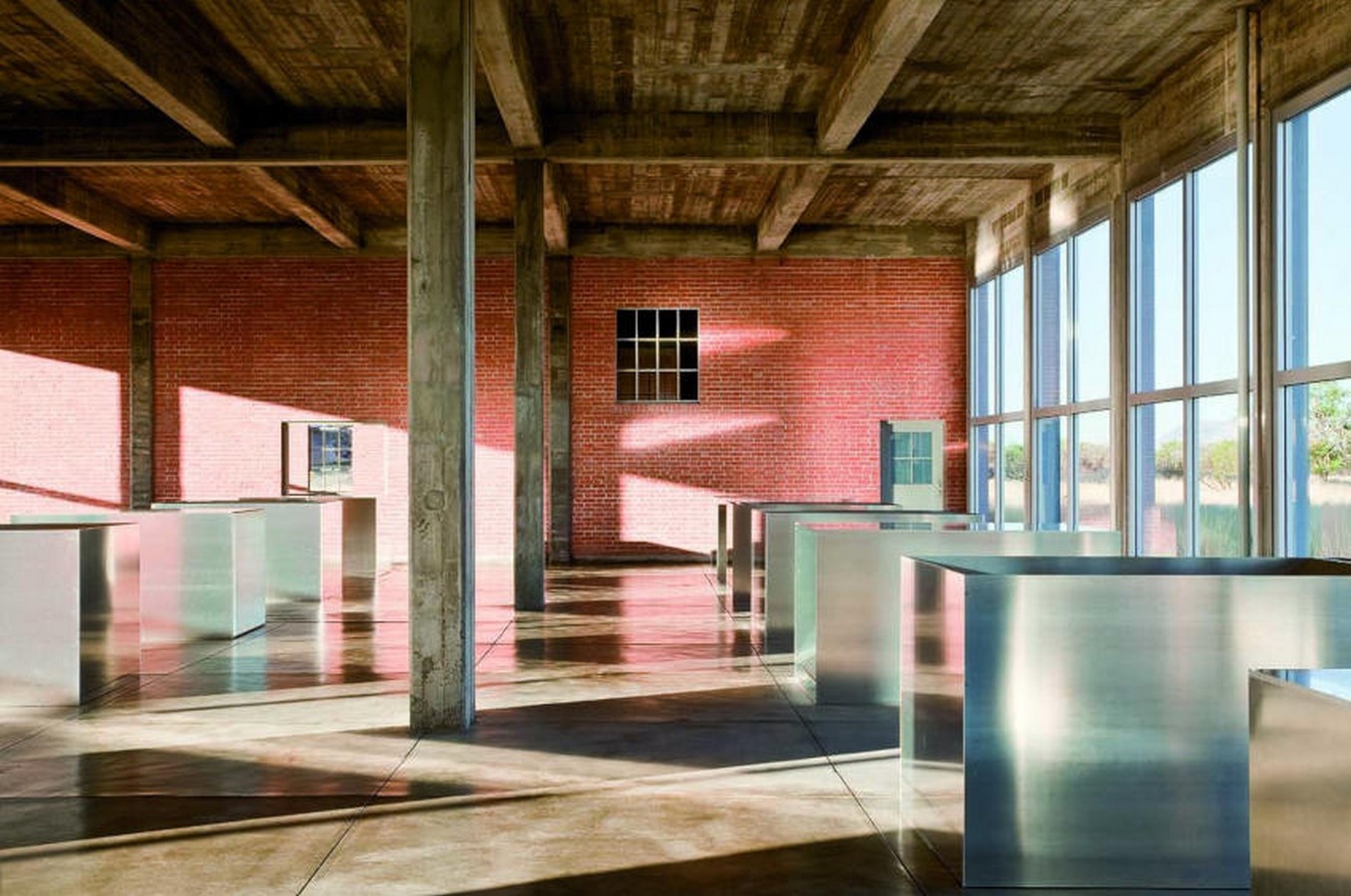 Donald Judd - 100 untitled works in mill aluminum, 1982-1986. Permanent collection, the Chinati Foundation, Marfa, Texas. Photo by Douglas Tuck, Judd Art © Judd Foundation / Licensed by VAGA, New York, NY