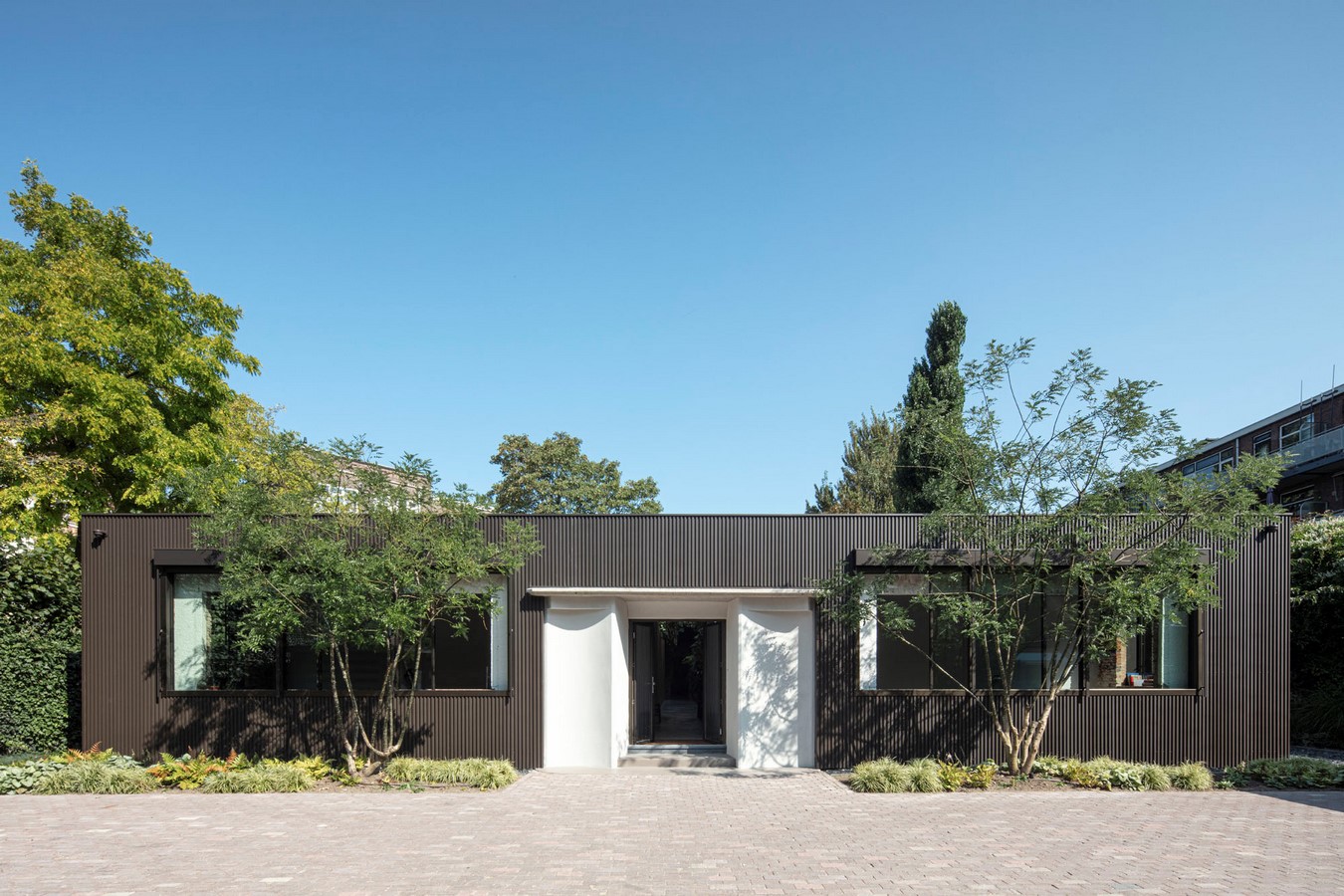 Abandoned 1940s Sports Building converted into New Villa With Naked Brick Walls by MASA Architects - Sheet1