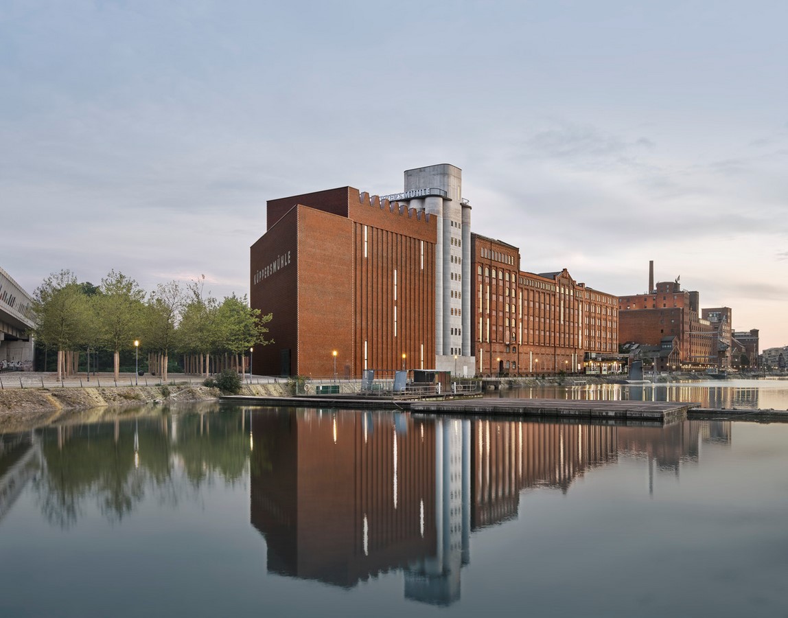 Brick Façade combined with White Cubes For Extension Of Küppersmühle Museum designed by Herzog & De Meuron - Sheet1