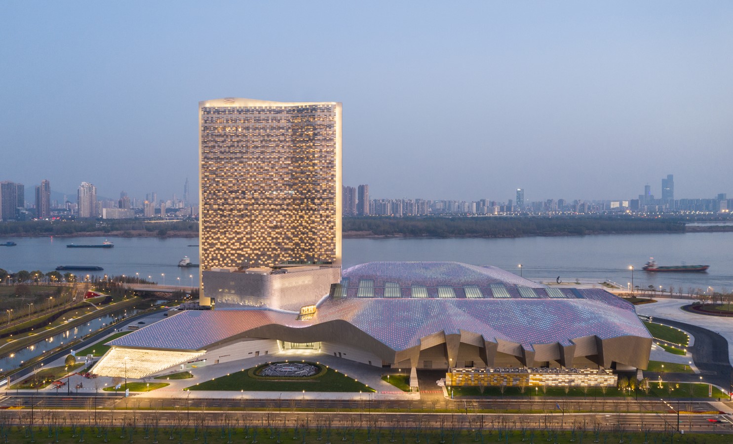 Titanium clad convention center alongside the Yangtze river completed by Morphosis  - Sheet3
