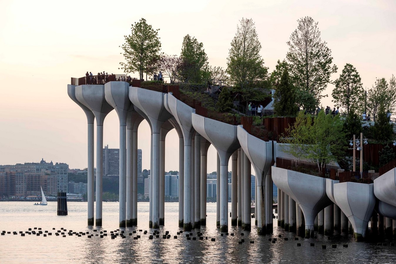 Precast concrete pots inspired by the ice patterns formed around the piles during winters _©www.timothyschenck.com