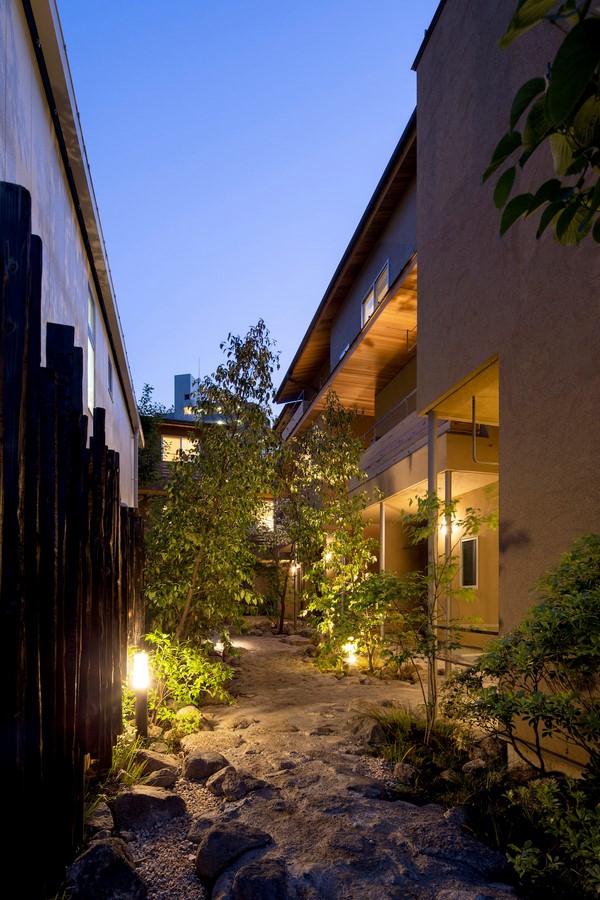 Company name : Love Architecture Inc.  Address : 2-20-14 Miyasaka Setagaya Tokyo,Japan  Phone : +81-3-5844-6830  Fax  : +81-3-5844-6831  E-mail : asari@lovearchitecture.co.jp  URL : www.lovearchitecture.co.jp   Credit InformationArchitecture : Yukio AsariPhotography : Masao Nishikawa   Project OutlineLocation : Tokyo, Japan   Date of Completion : March 2018 Principal Use : Rental apartment Structure : Wooden construction Site Area : 558.67m2 Total Floor Area :706.23m2 (255.76m2/1F, 227.99m2/2F, 222.48m2/3F)  Structural Engineer : Nakamura Tsuguho Mechanical Engineer : Hiroyuki Sakamaki  Material Information Exterior Finish (Wall) : Resin based plastering Exterior Finish (Floor) : Natural stone/Decomposed granite soil Floor : Oak flooring, Urethane clear paint/ Tile finish Wall : Cross Ceiling : Cross - Sheet11