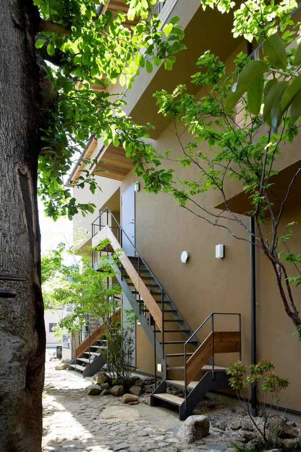 Company name : Love Architecture Inc.  Address : 2-20-14 Miyasaka Setagaya Tokyo,Japan  Phone : +81-3-5844-6830  Fax  : +81-3-5844-6831  E-mail : asari@lovearchitecture.co.jp  URL : www.lovearchitecture.co.jp   Credit InformationArchitecture : Yukio AsariPhotography : Masao Nishikawa   Project OutlineLocation : Tokyo, Japan   Date of Completion : March 2018 Principal Use : Rental apartment Structure : Wooden construction Site Area : 558.67m2 Total Floor Area :706.23m2 (255.76m2/1F, 227.99m2/2F, 222.48m2/3F)  Structural Engineer : Nakamura Tsuguho Mechanical Engineer : Hiroyuki Sakamaki  Material Information Exterior Finish (Wall) : Resin based plastering Exterior Finish (Floor) : Natural stone/Decomposed granite soil Floor : Oak flooring, Urethane clear paint/ Tile finish Wall : Cross Ceiling : Cross - Sheet2