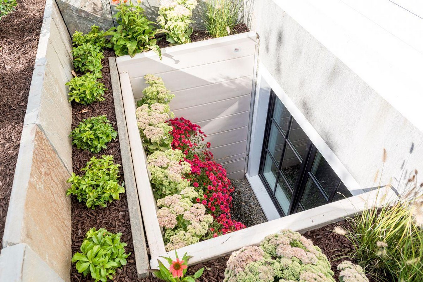 Egress terraced window provides natural ventilation and outdoor access_©www.thisoldhouse.com