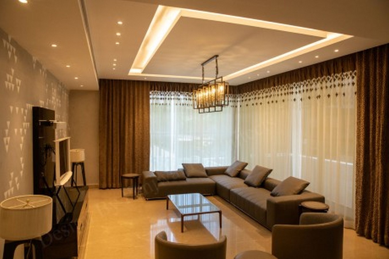 Living Room Interior Design _©https://www.panjwaniarchitects.com/assets/thumb.php?src=media/portfolio-home/p_02.jpg?w=999