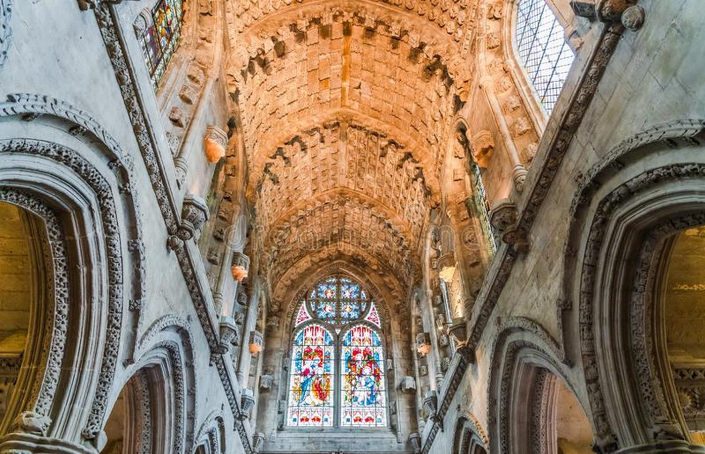 Daylight through the large windows illuminates the spectacular ceiling vault, decorated with roses, lilies, and embossed stars_ ©Photofires