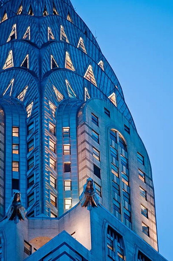 The arches with triangular windows and the Gargoyles_©Tetra Images/Getty
