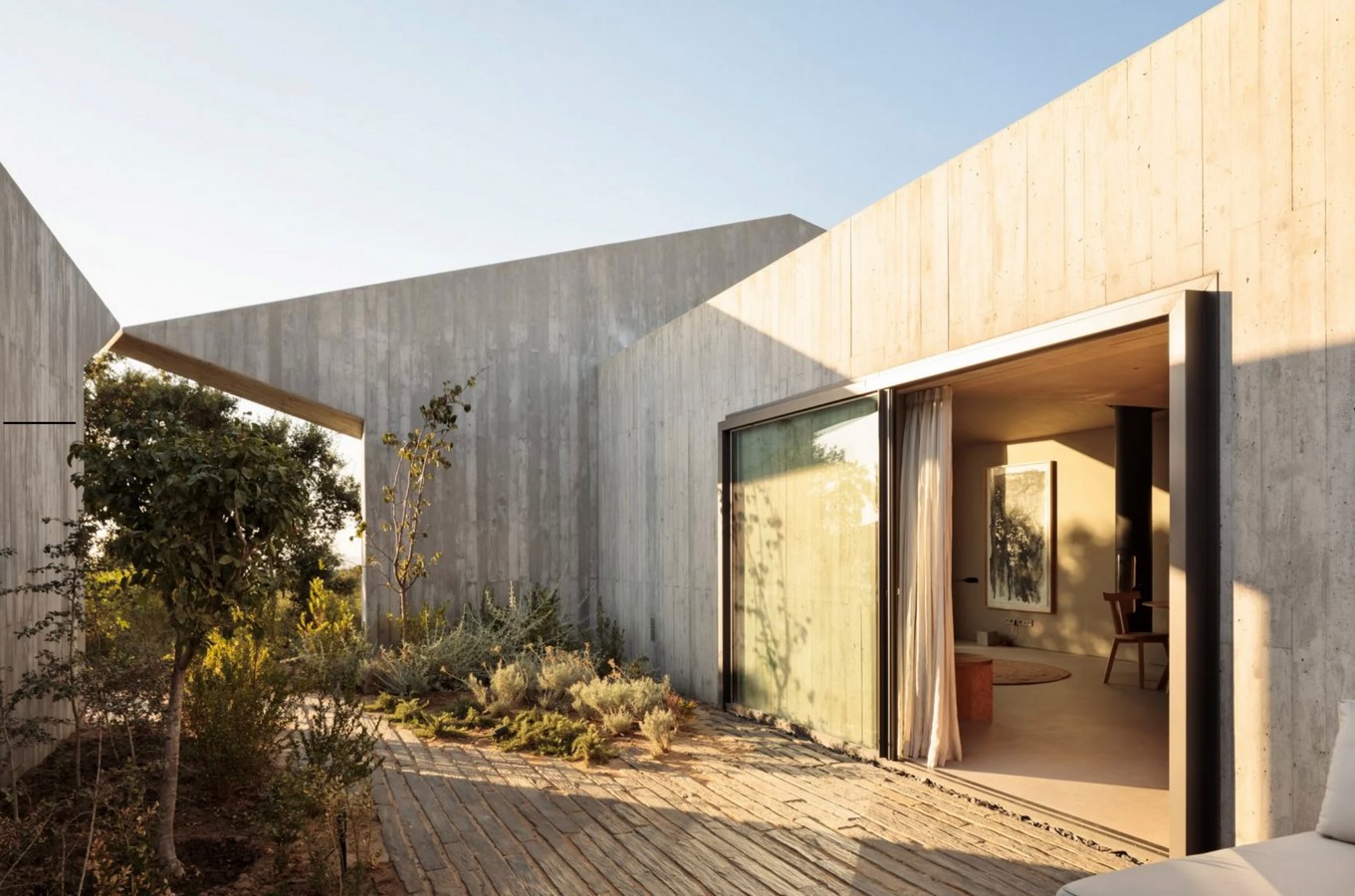 Minimalist concrete holiday homes with matching cutaways built by Manuel Aires Mateus - Sheet5