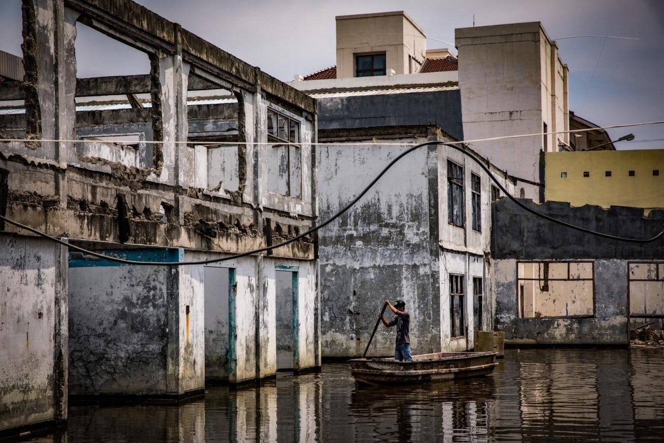 Jakarta's Race Against Time: Battling Sinking and Flooding Amid Global Warming - Sheet3