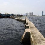 Jakarta's Race Against Time: Battling Sinking and Flooding Amid Global Warming - Sheet5