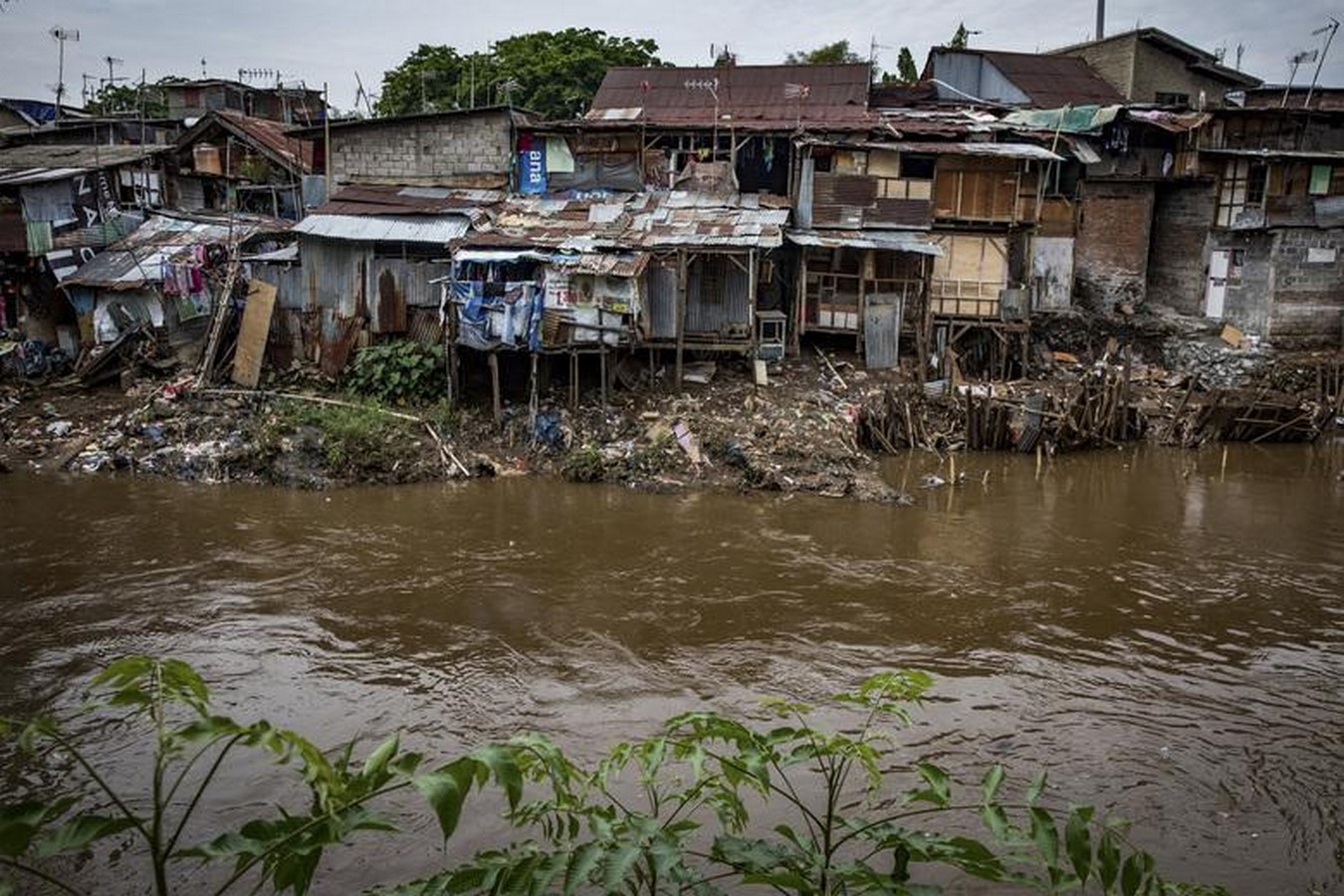 Jakarta's Race Against Time: Battling Sinking and Flooding Amid Global Warming - Sheet7