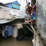 Jakarta's Race Against Time: Battling Sinking and Flooding Amid Global Warming - Sheet9