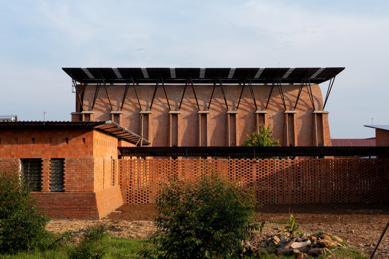 The Victoria Monastery, founded in 1952 in Kenya, was relocated to Uganda in 2008 due to post-election instability. Localworks designed the monastery, which includes the Church - Sheet1