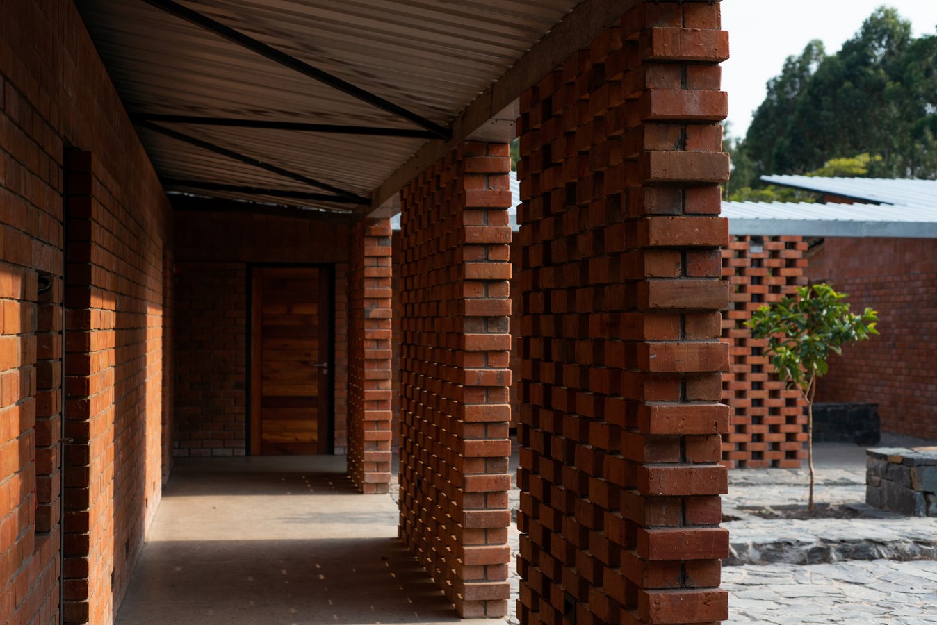 The Victoria Monastery, founded in 1952 in Kenya, was relocated to Uganda in 2008 due to post-election instability. Localworks designed the monastery, which includes the Church - Sheet3