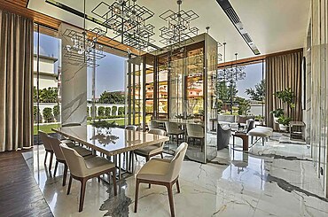 The modern interlock of living and dining space by 42MM Architecture