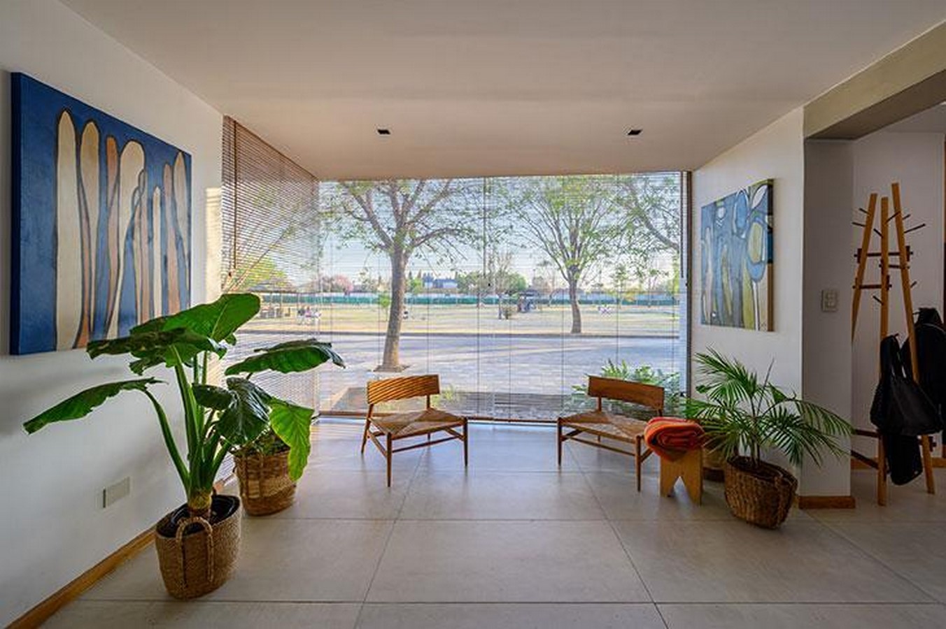 Christian Schlatter uses weathering steel to enclose the house in Córdoba with screens-Sheet2