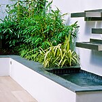 ROOF TERRACE WITH THREE METAL CONTAINERS PLANTED WITH ZANTEDESCHIA AETHIOPICA. DESIGNER: AMIR SCHLEZINGER/ MY LANDSCAPES-Sheet3