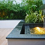 ROOF TERRACE WITH THREE METAL CONTAINERS PLANTED WITH ZANTEDESCHIA AETHIOPICA. DESIGNER: AMIR SCHLEZINGER/ MY LANDSCAPES-Sheet6