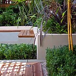 WOODEN TERRACE BESIDE HOUSE WITH TABLE AND CHAIRS PHYLLOSTACHYS VIVAX 'AUREOCALLIS' AND BOX. DESIGN : AMIR SCHLEZINGER/ MY LANDSCAPES-Sheet6