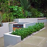 WOODEN TERRACE BESIDE HOUSE WITH TABLE AND CHAIRS PHYLLOSTACHYS VIVAX 'AUREOCALLIS' AND BOX. DESIGN : AMIR SCHLEZINGER/ MY LANDSCAPES-Sheet7
