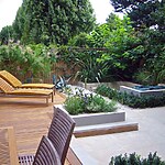 WOODEN TERRACE BESIDE HOUSE WITH TABLE AND CHAIRS PHYLLOSTACHYS VIVAX 'AUREOCALLIS' AND BOX. DESIGN : AMIR SCHLEZINGER/ MY LANDSCAPES-Sheet8