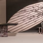 In an era where excess often defines aspiration, Haruma takes a more measured path—one that finds luxury in restraint, nuance, and enduring design. This approach, often described as quiet luxury, is less about visibility and more about presence: a philosophy rooted in subtlety, authenticity, and timeless appeal. At its core, Haruma’s design process is not driven by trends but by a careful understanding of balance—between proportion, material, and detail. Each piece emerges through a process of refinement, where nothing feels forced and everything finds its place organically. In contrast to a culture of constant amplification, the brand gravitates toward a more introspective way of making—one that privileges clarity over ornamentation. Quiet luxury does not announce itself loudly. Instead, it reveals its value gradually, through thoughtful detailing and a sense of permanence. For Haruma, this translates into forms that are understated yet deeply considered, surfaces that invite touch, and compositions that feel complete without excess. Furniture, in this context, transcends utility, it becomes a part of everyday living, shaping spaces with a calm, assured presence. Materiality plays a defining role in this narrative. Rather than being treated as a surface treatment, materials are allowed to express their inherent qualities. As founder Parth Patel explains, “There is a certain power in letting materials speak for themselves. The depth of natural wood or the quiet glow of brushed metal can communicate far more than decorative complexity. When left unforced, materials create a more intimate and sensory connection.” This emphasis on tactility shifts the focus from visual spectacle to experiential richness. Equally important is the approach to craftsmanship. At Haruma, making is guided by precision and restraint rather than display. The emphasis lies in refined execution—clean joinery, balanced proportions, and finishes that feel seamless. The craftsmanship is not meant to draw attention to itself but to support the integrity of the design. It is something that is sensed rather than overtly seen. There is a quiet strength in restraint. While excess seeks to capture attention instantly, restraint allows design to unfold over time. A well-proportioned form, a muted palette, or a minimal silhouette can create a lasting impression precisely because it does not try too hard. This subtlety becomes the defining characteristic of quiet luxury, its ability to engage without overwhelming. Longevity is another essential dimension of this philosophy. Every decision, from the selection of materials to the resolution of form, is made with time in mind. “We believe that true luxury lies in permanence,” Patel adds. “A piece should not feel dated after a few years. It should evolve, gathering character while retaining its essence.” In this way, furniture becomes something that lives and grows with its environment, rather than being replaced by it. This sensibility is evident in Haruma’s key pieces, such as the Coarse Frame, Blade Console, and Sietch Table. Each design carries a distinct identity while remaining rooted in the same ethos; understated, tactile, and enduring. These are objects meant to be experienced over time, revealing new nuances through use and interaction. The appeal of quiet luxury is especially resonant today, as a new generation of homeowners seeks meaning beyond display. There is a growing preference for authenticity, for environments that feel personal rather than performative. Luxury, in this context, is no longer defined by extravagance but by comfort, clarity, and a sense of grounding. For Haruma, this is not a fixed philosophy but an evolving journey. The brand continues to explore new materials, refine its techniques, and expand its understanding of what it means to design with intention. The aim is not just to create furniture, but to shape experiences, pieces that sit effortlessly within a space while enhancing the way it is lived in. Quiet luxury ultimately resists extremes. It is not about having less or more, but about finding the right balance. It is expressed through thoughtful restraint, honest materials, and a commitment to longevity, design that does not demand attention, but quietly earns it over time. -Sheet5